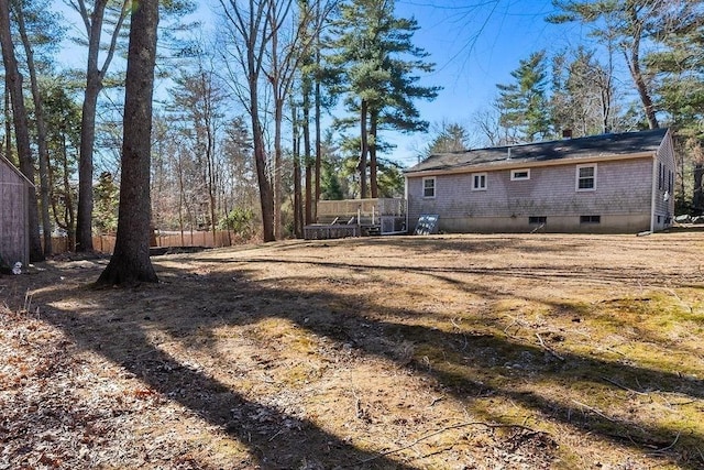 rear view of property with fence