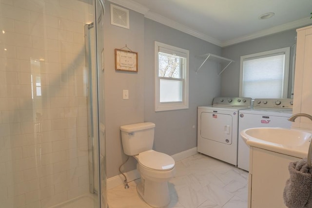 bathroom with visible vents, toilet, baseboards, a shower stall, and independent washer and dryer