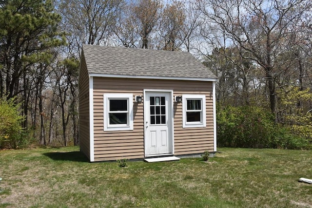 view of outbuilding with an outbuilding