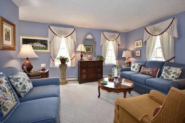 living area with baseboard heating and baseboards