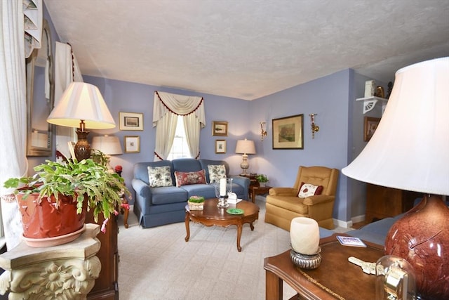 living area featuring baseboards