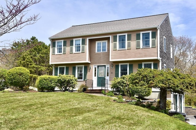 view of front facade with a front yard