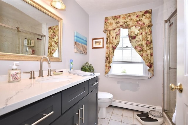 full bath featuring a baseboard radiator, tile patterned flooring, a stall shower, and vanity