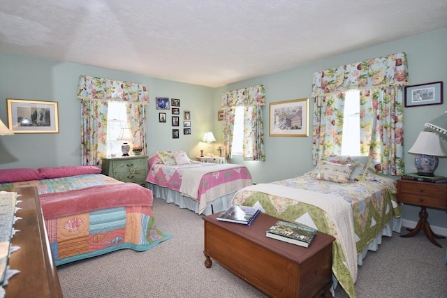 bedroom featuring carpet