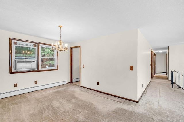 unfurnished room featuring cooling unit, a baseboard radiator, an inviting chandelier, carpet flooring, and baseboard heating