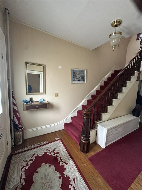 29 Arch, New Bedford, MA 02740 - foyer entrance with stairway and wood finished floors