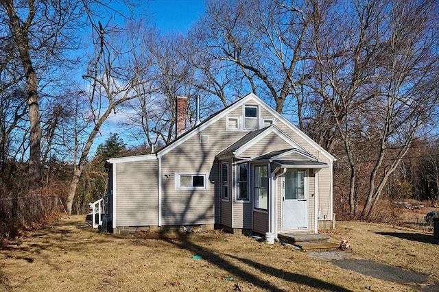 view of outbuilding featuring a yard