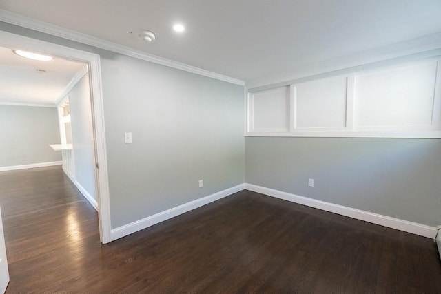 unfurnished room with dark wood-type flooring and ornamental molding