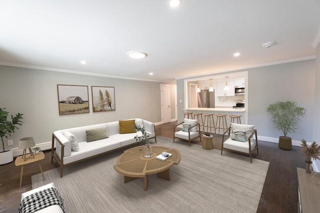 living room with crown molding and hardwood / wood-style floors