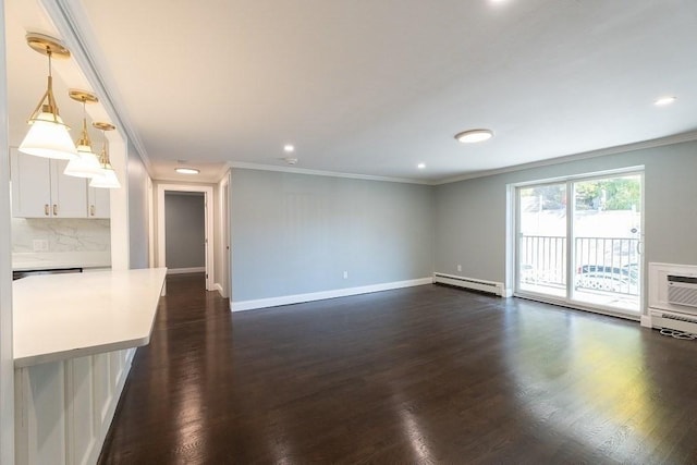 unfurnished living room featuring a wall mounted air conditioner, dark hardwood / wood-style floors, ornamental molding, and baseboard heating