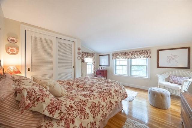 10 Victoria Cir, Norwood, MA 02062 - bedroom featuring a closet, vaulted ceiling, and wood finished floors
