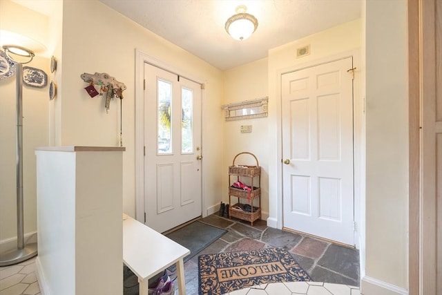 10 Victoria Cir, Norwood, MA 02062 - entrance foyer featuring baseboards