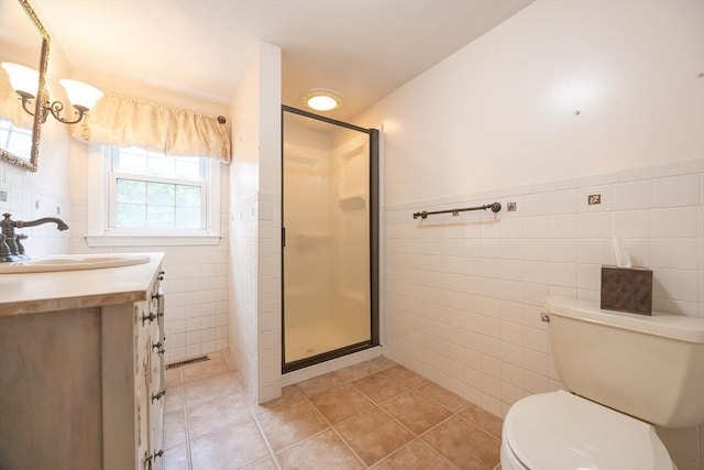 10 Victoria Cir, Norwood, MA 02062 - bathroom featuring tile walls, tile patterned flooring, a shower stall, wainscoting, and vanity