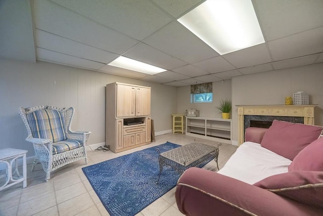 10 Victoria Cir, Norwood, MA 02062 - living area with light tile patterned floors and a drop ceiling