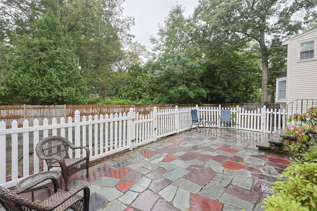 10 Victoria Cir, Norwood, MA 02062 - fenced backyard with a patio