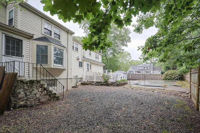 10 Victoria Cir, Norwood, MA 02062 - fenced yard featuring a patio