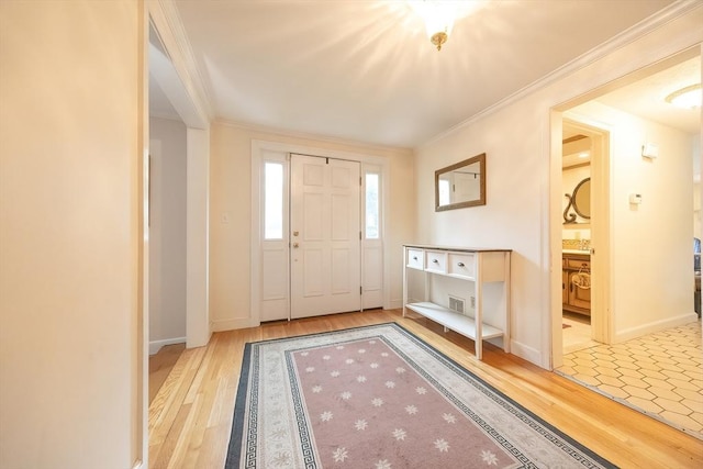 10 Victoria Cir, Norwood, MA 02062 - entrance foyer featuring wood finished floors and crown molding