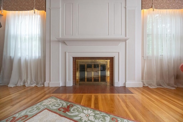 10 Victoria Cir, Norwood, MA 02062 - detailed view of a fireplace with flush hearth and wood finished floors