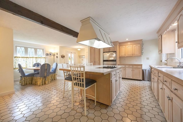 10 Victoria Cir, Norwood, MA 02062 - kitchen featuring light brown cabinets, stainless steel fridge, light countertops, a kitchen island, and recessed lighting