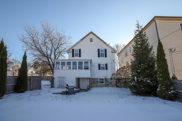 view of snow covered house