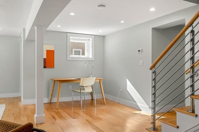 office featuring baseboards, wood finished floors, and recessed lighting