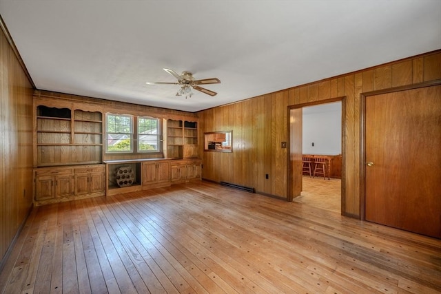 10 Primrose Rd, Billerica, MA 01821 - unfurnished room featuring wooden walls, ceiling fan, and light wood-style flooring