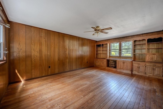10 Primrose Rd, Billerica, MA 01821 - unfurnished room featuring wood walls, light wood finished floors, and ceiling fan