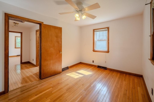 10 Primrose Rd, Billerica, MA 01821 - unfurnished room featuring light wood-type flooring, healthy amount of natural light, and a ceiling fan
