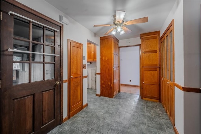 10 Primrose Rd, Billerica, MA 01821 - corridor with baseboards and stone finish floors