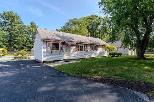 10 Primrose Rd, Billerica, MA 01821 - view of front facade with a shingled roof