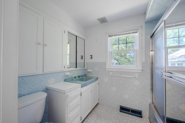 10 Primrose Rd, Billerica, MA 01821 - bathroom featuring vanity, tile patterned floors, and enclosed tub / shower combo