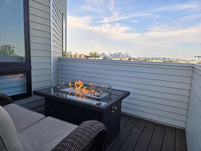 29 Woodford St Penthouse, Penthouse, Boston, MA 02125 - wooden terrace featuring a fire pit and a skyline view