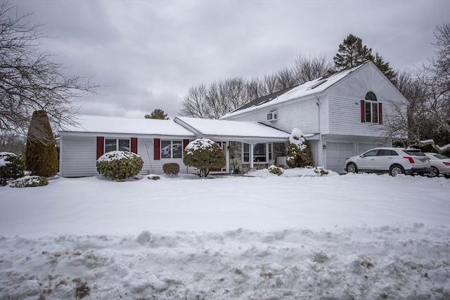 traditional-style home featuring a garage