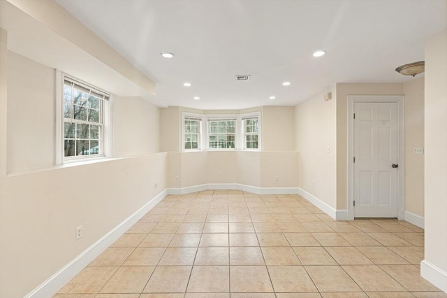213-215 Florence St Unit 1, Boston, MA 02131 - spare room featuring recessed lighting, healthy amount of natural light, baseboards, and light tile patterned floors
