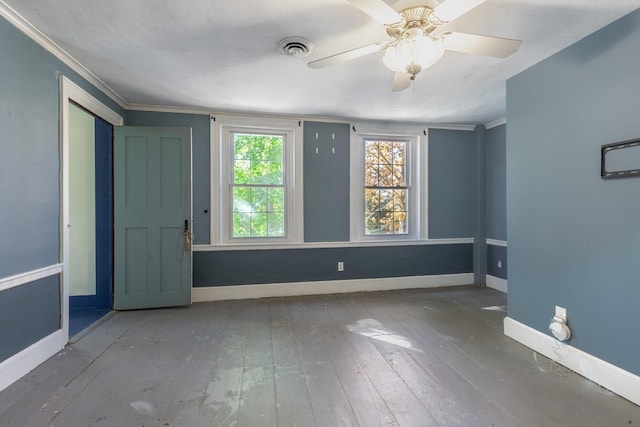 unfurnished room featuring ornamental molding, hardwood / wood-style floors, and ceiling fan