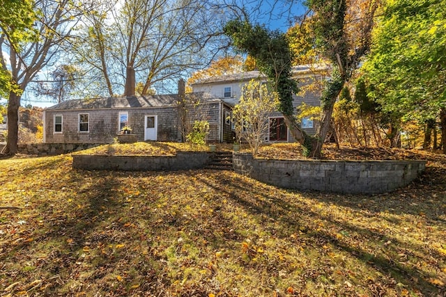 exterior space with a front yard