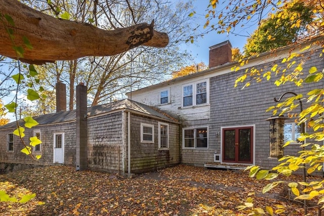 490 Plymouth, Bridgewater, MA 02324 - back of house with french doors and a chimney