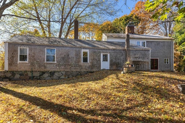 490 Plymouth, Bridgewater, MA 02324 - back of house with a chimney
