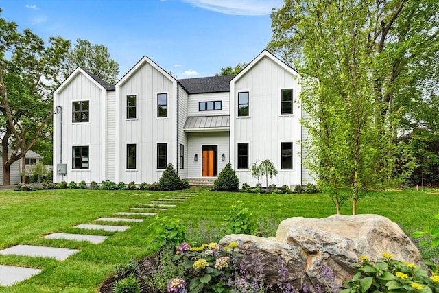 37 Philip, Lexington, MA 02421 - modern farmhouse style home with board and batten siding, a standing seam roof, and a front yard