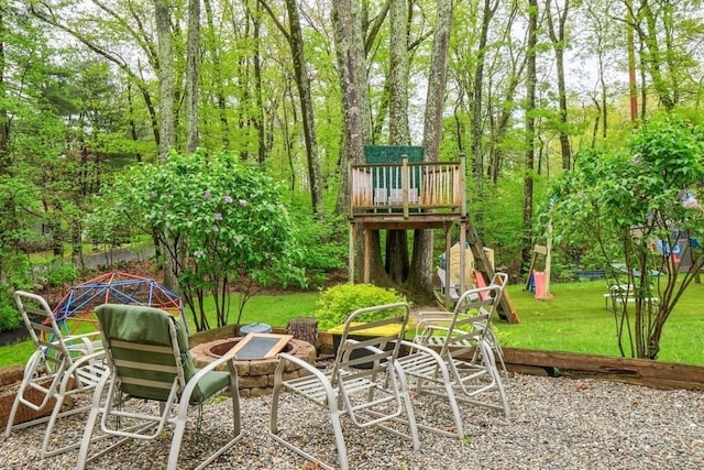 view of patio featuring a fire pit