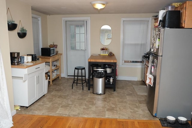 287 W 5th St, Boston, MA 02127 - dining area with baseboards