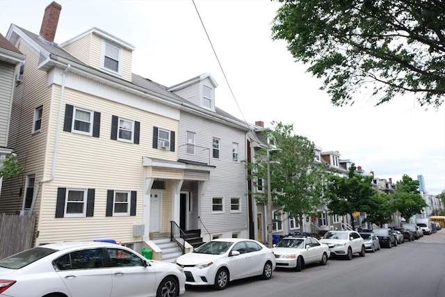 287 W 5th St, Boston, MA 02127 - view of front of property featuring entry steps and fence