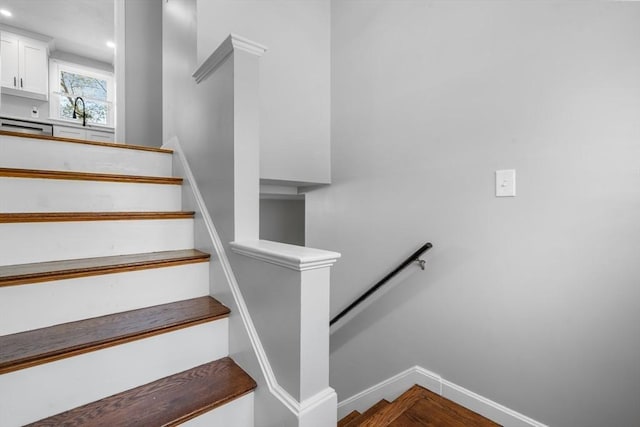 stairway featuring recessed lighting and baseboards