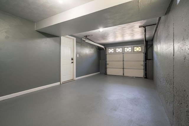 garage with baseboards