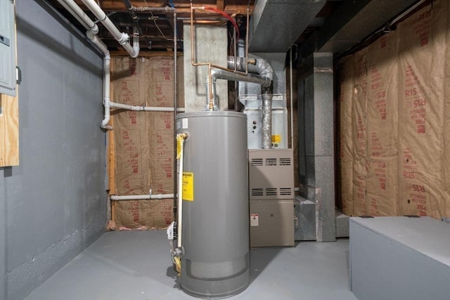 utility room featuring water heater