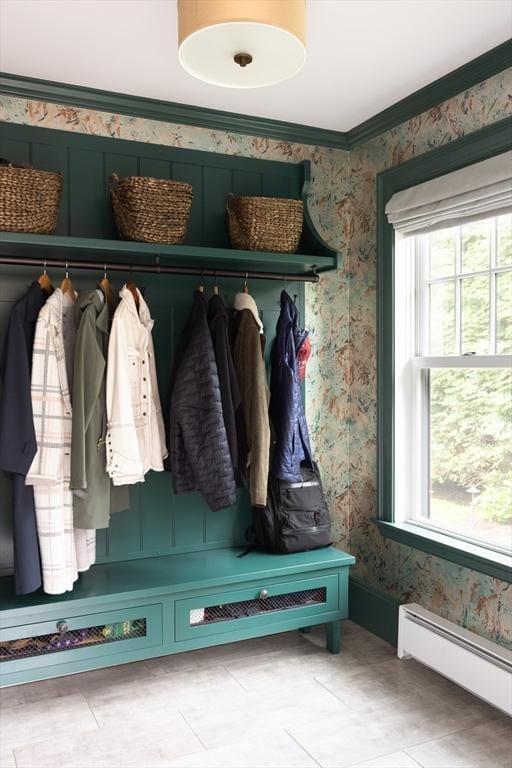 26 Sterling St, Newton, MA 02465 - mudroom featuring a baseboard heating unit, healthy amount of natural light, wallpapered walls, and ornamental molding