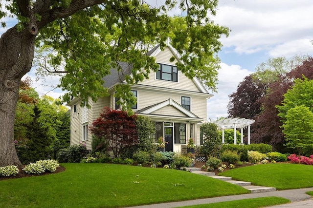 26 Sterling St, Newton, MA 02465 - traditional style home featuring a pergola and a front yard