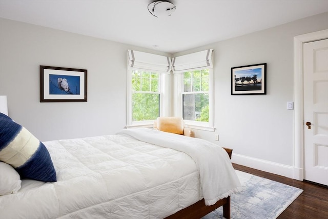 26 Sterling St, Newton, MA 02465 - bedroom featuring baseboards and wood finished floors