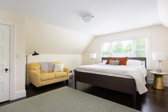 26 Sterling St, Newton, MA 02465 - bedroom featuring lofted ceiling, wood finished floors, and baseboards