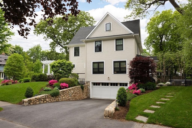 26 Sterling St, Newton, MA 02465 - view of front of house with asphalt driveway, a garage, and a pergola